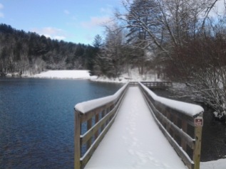 The boardwalk at Black Rock Lake covered in snow.